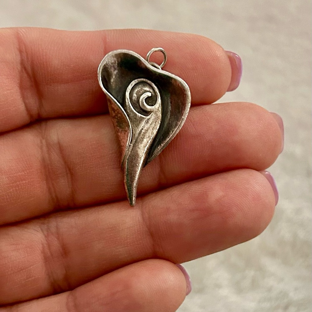 “What lies beneath “ Madison’s pendant (replica) sterling silver